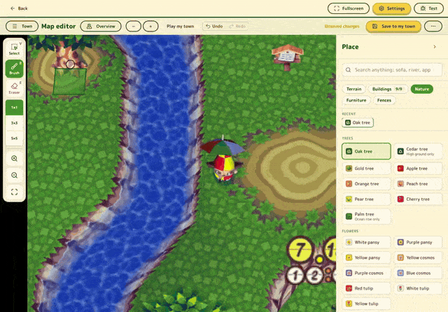 A town being edited in the map editor, oak trees and a bed of white pansies planted beside a river